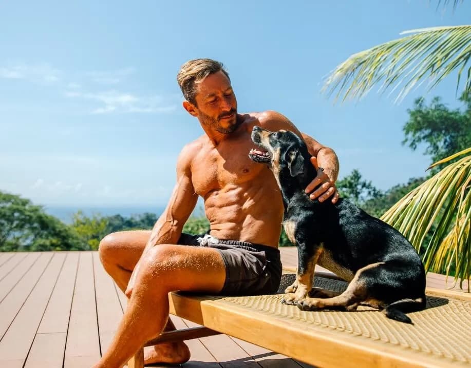 Paul Saladino outdoors with his dog